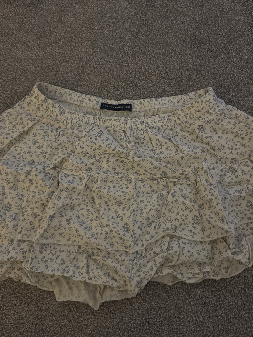 Brandy Melville Cream Mini Skirt with Blue Floral Print